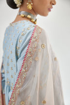 Blue silk chanderi kurta-dress set with zari, dori and gota embroidery, highlighted with contrast bead work.
