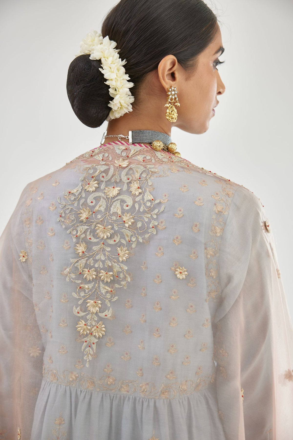 Blue silk chanderi kurta-dress set with zari, dori and gota embroidery, highlighted with contrast bead work.