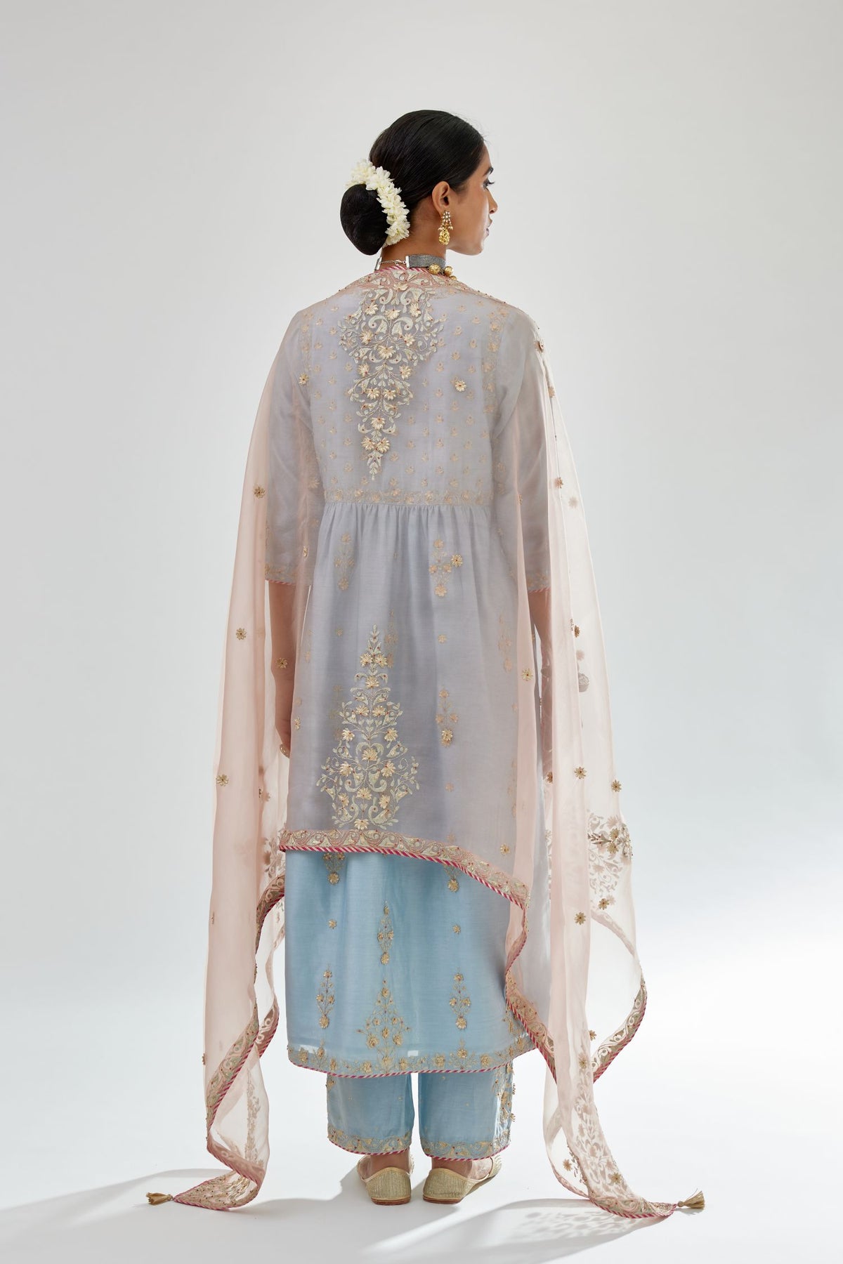 Blue silk chanderi kurta-dress set with zari, dori and gota embroidery, highlighted with contrast bead work.