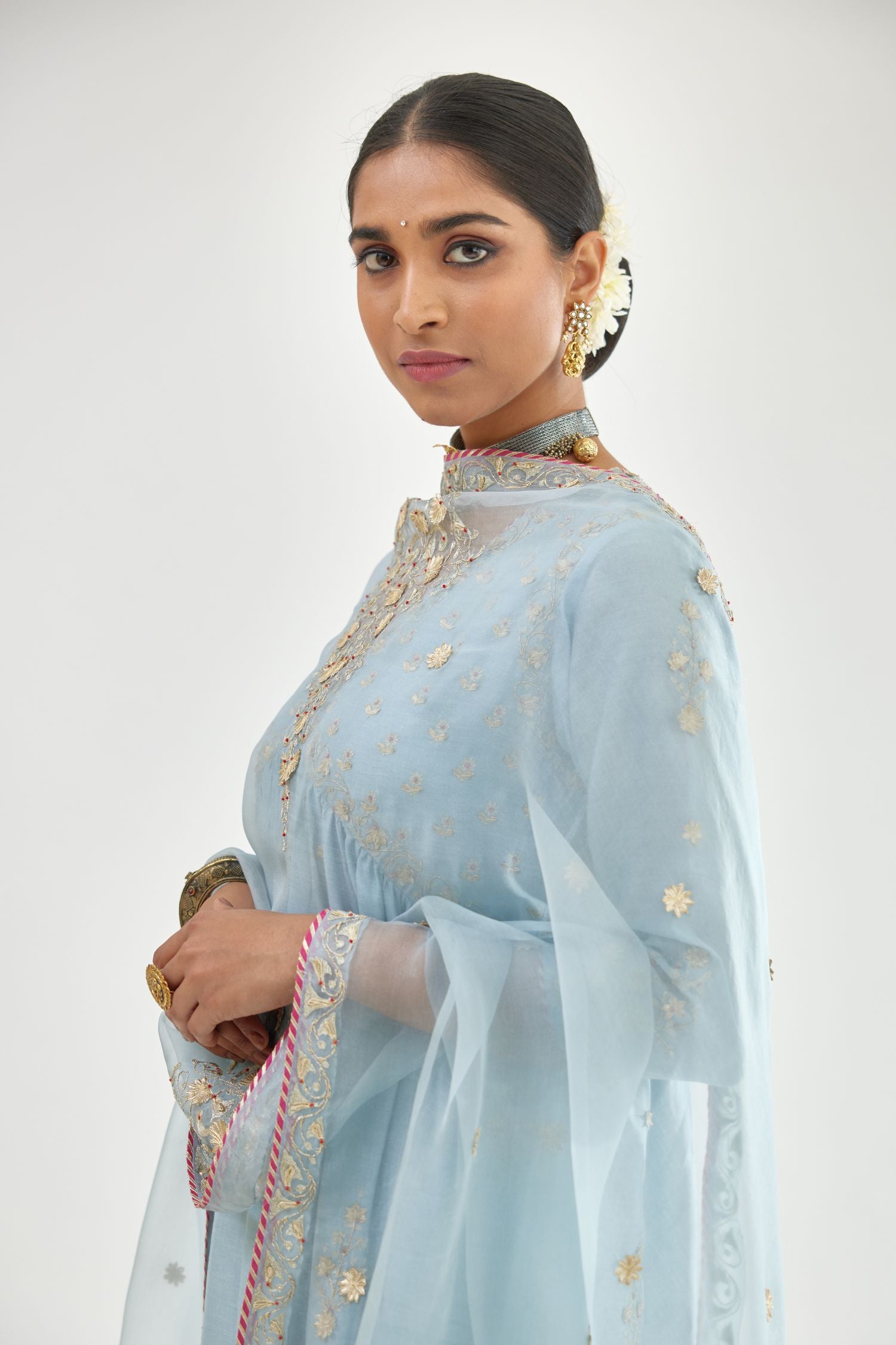 Blue silk organza dupatta with dori and gota embroidery at edges, highlighted with contrast bead work.