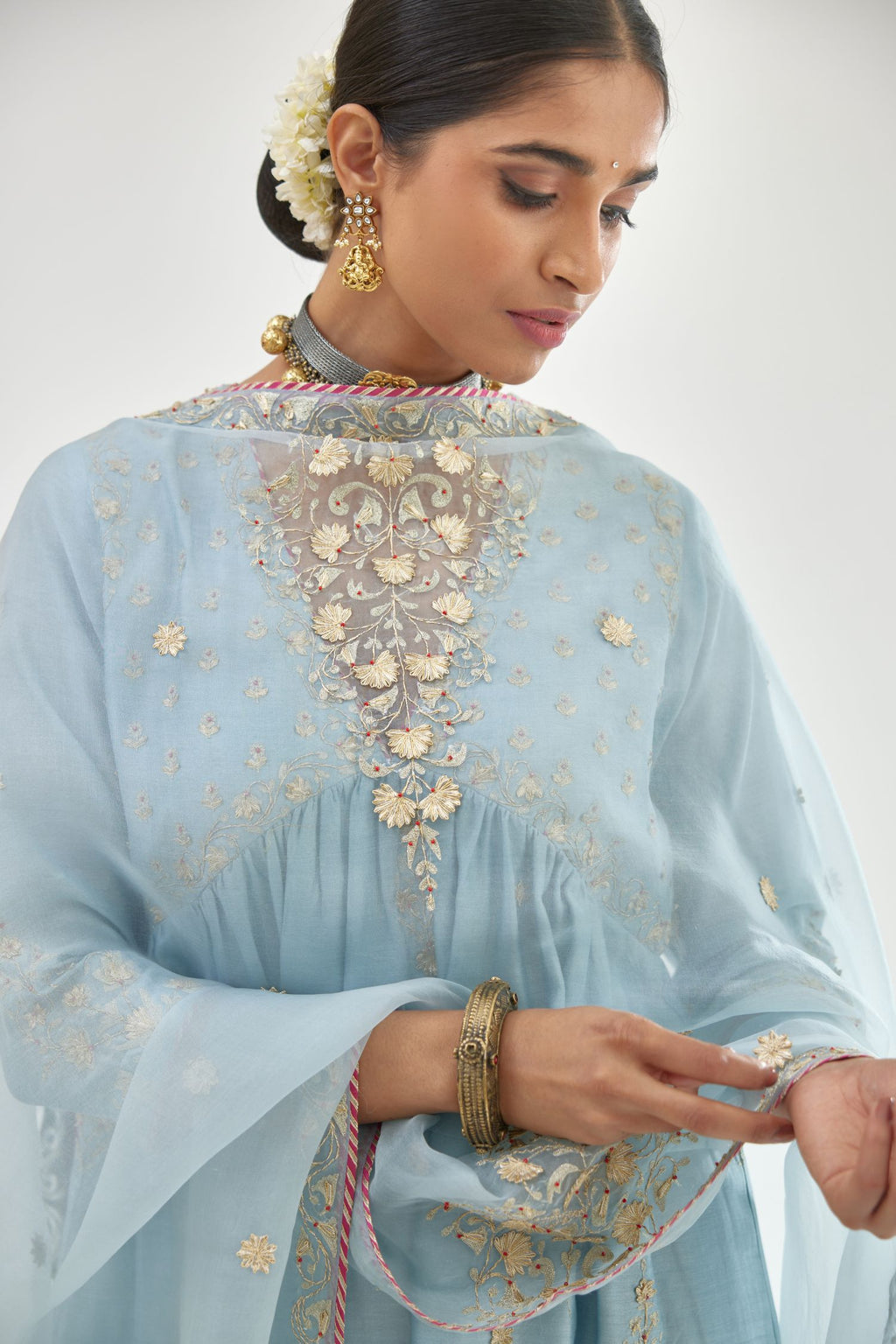 Blue silk chanderi kurta-dress set with zari, dori and gota embroidery, highlighted with contrast bead work.