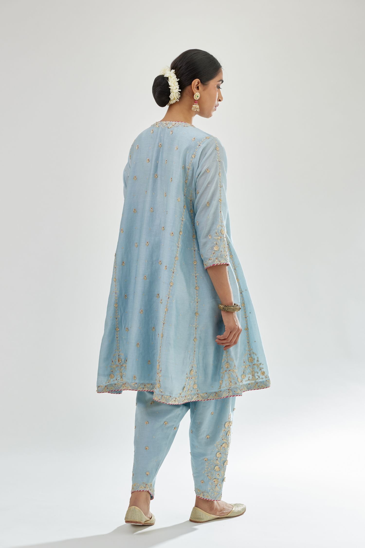 Blue silk chanderi short kalidar kurta set with all-over delicate zari bootis, detailed with dori embroidery and contrast bead work.