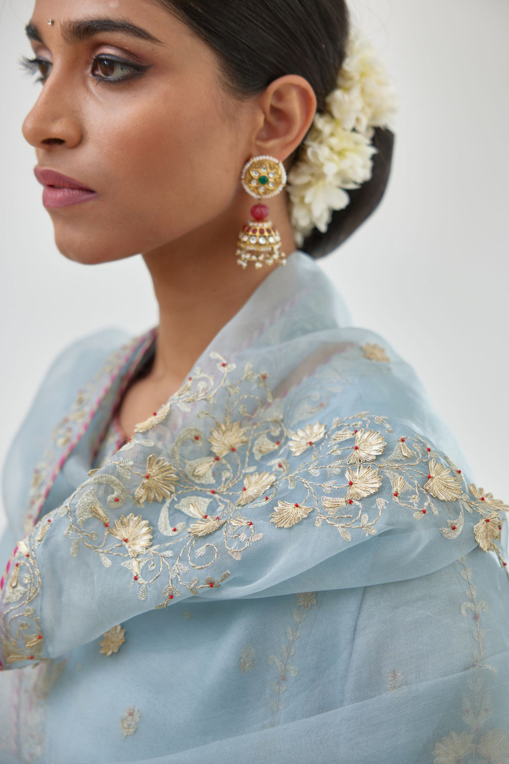 Blue silk organza dupatta with dori and gota embroidery at edges, highlighted with contrast bead work.