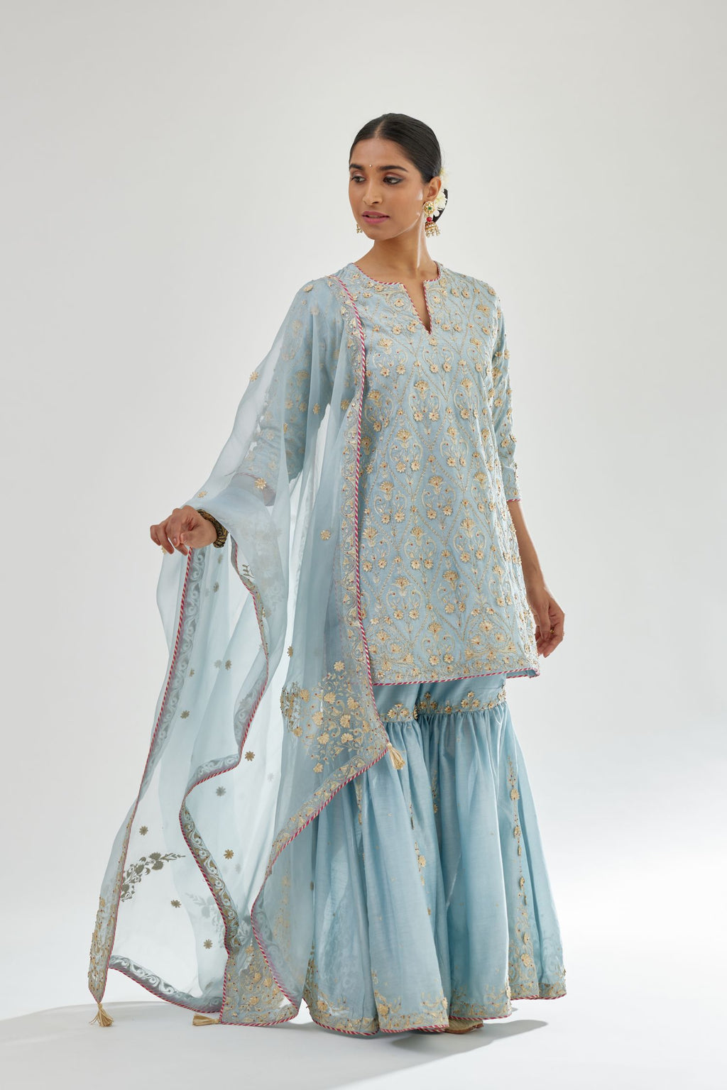 Blue silk organza dupatta with dori and gota embroidery at edges, highlighted with contrast bead work.