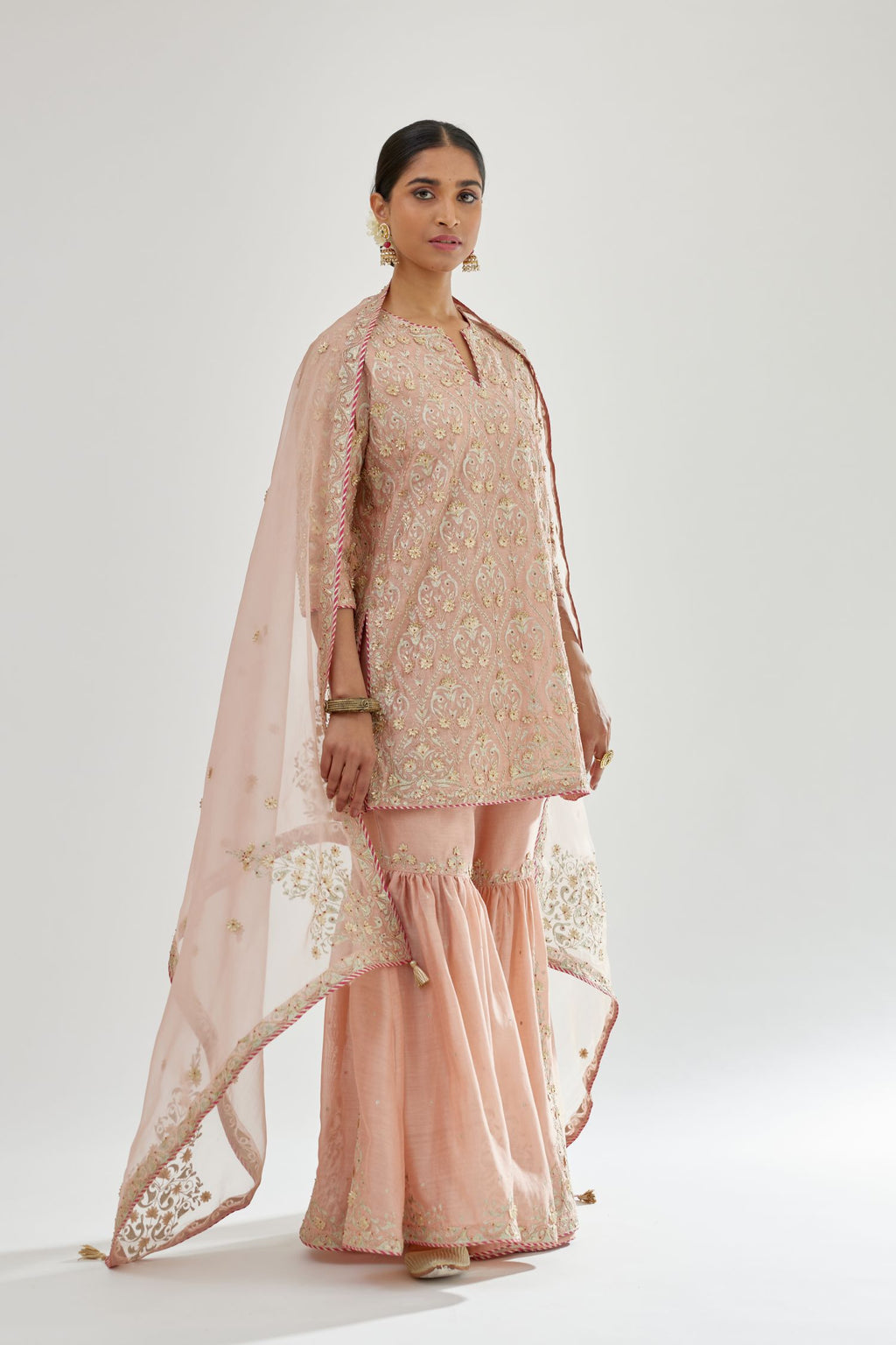 Pink silk organza dupatta with dori and gota embroidery at edges, highlighted with contrast bead work.