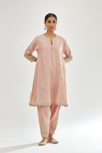 Pink silk chanderi short kalidar kurta set with all-over delicate zari bootis, detailed with dori embroidery and contrast bead work.