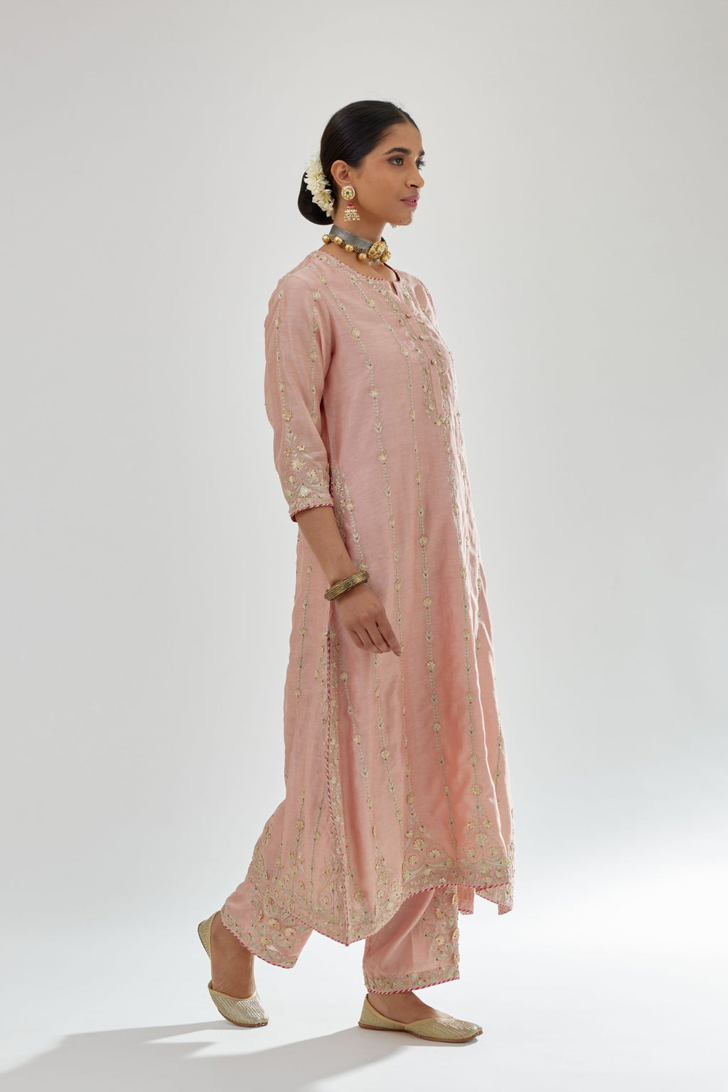 Pink silk chanderi straight kurta set with all over heavy dori and gota embroidery work, highlighted with contrast bead work.