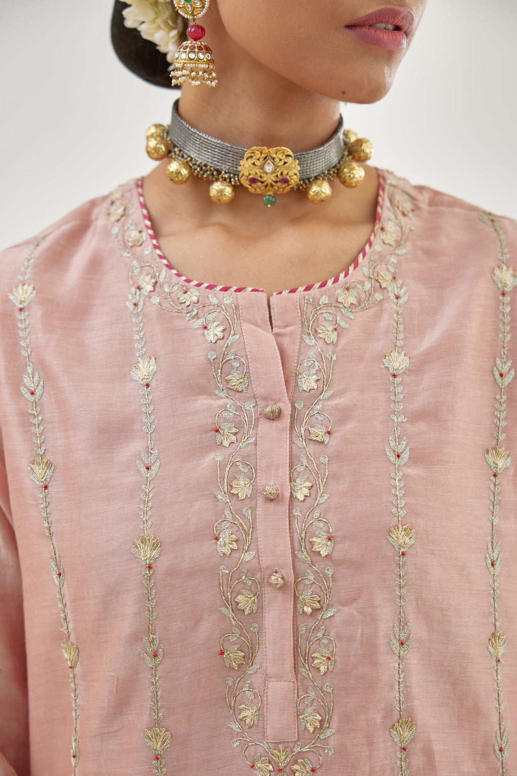 Pink silk chanderi straight kurta set with all over heavy dori and gota embroidery work, highlighted with contrast bead work.