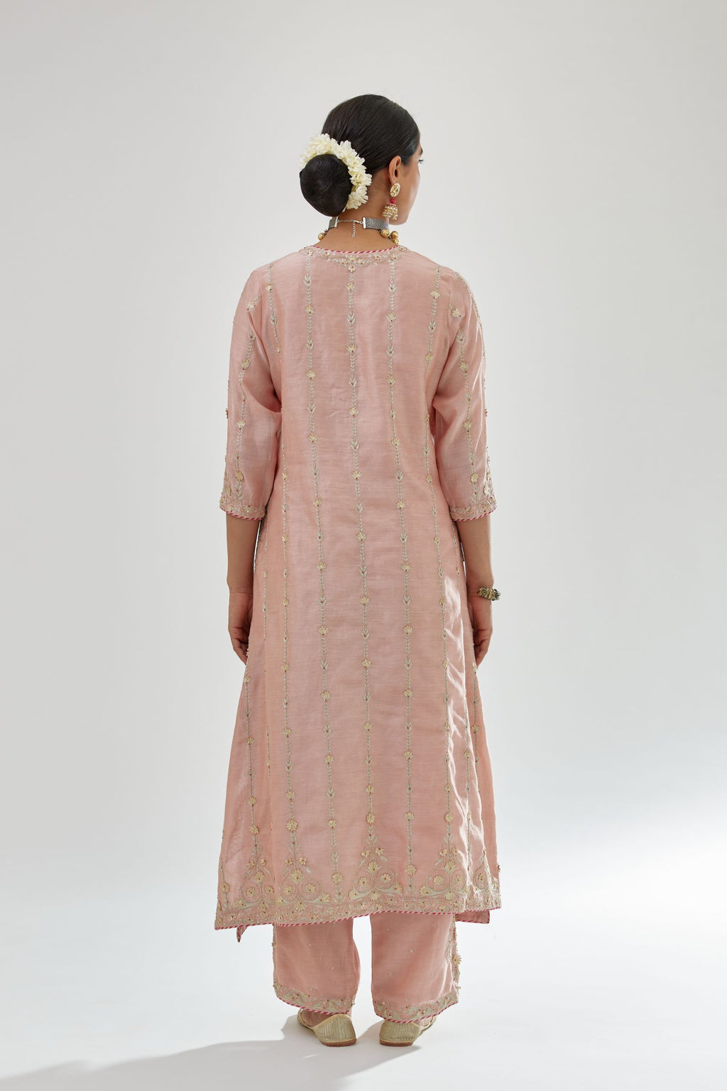 Pink silk chanderi straight kurta set with all over heavy dori and gota embroidery work, highlighted with contrast bead work.