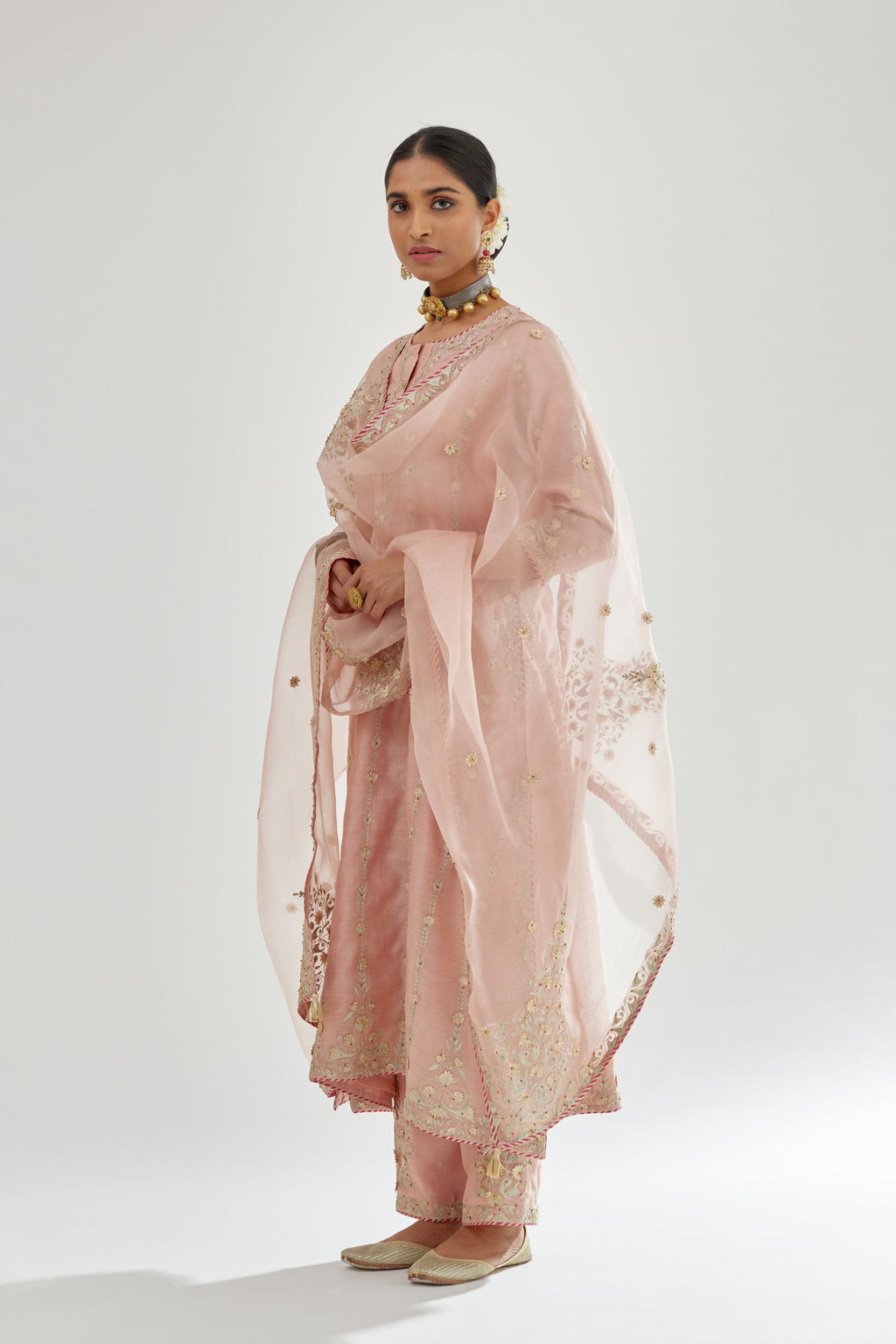 Pink silk chanderi straight kurta set with all over heavy dori and gota embroidery work, highlighted with contrast bead work.