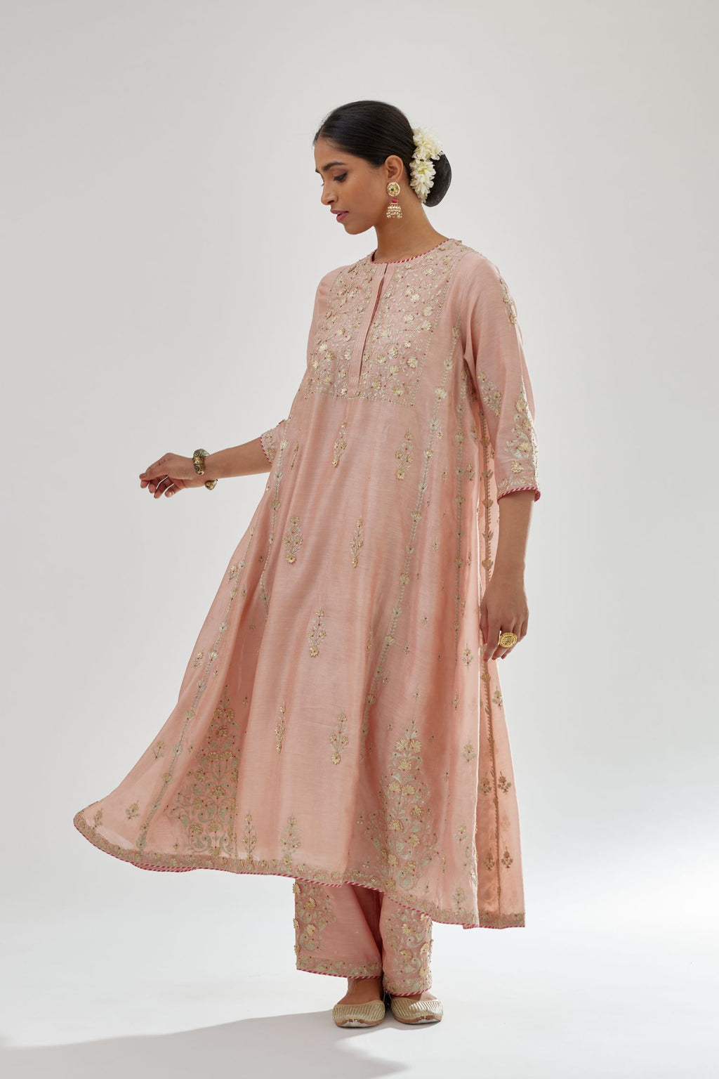 Pink A-line long kurta set with all-over zari, dori, sequins and gota embroidery.