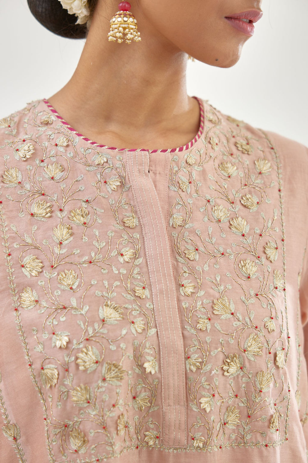 Pink A-line long kurta set with all-over zari, dori, sequins and gota embroidery.