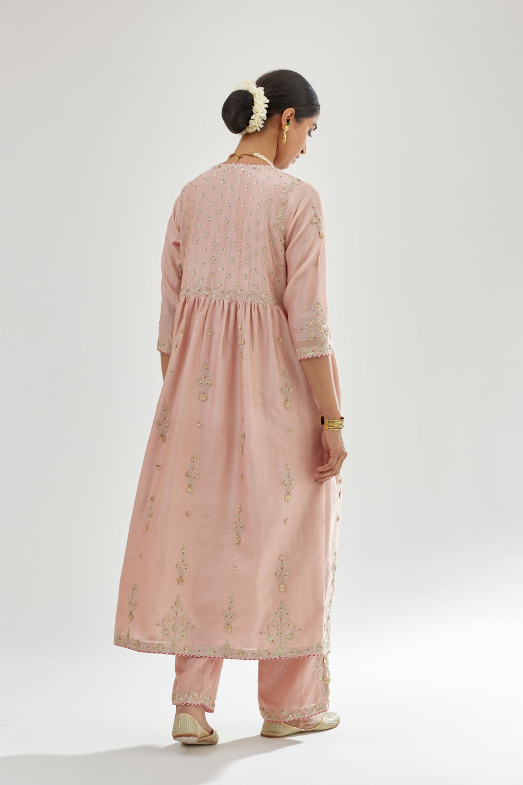 Pink silk chanderi kurta-dress set with zari, dori and gota embroidery, highlighted with contrast bead work.