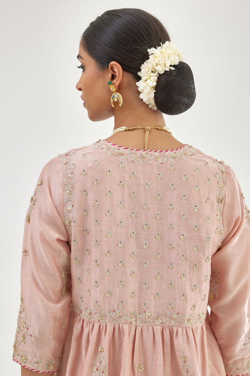 Pink silk chanderi kurta-dress set with zari, dori and gota embroidery, highlighted with contrast bead work.