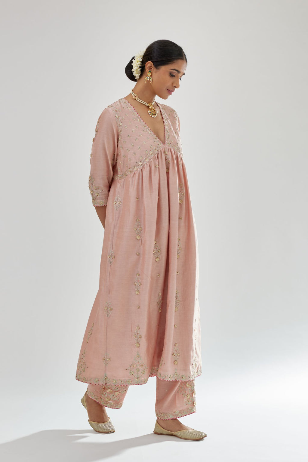 Pink silk chanderi kurta-dress set with zari, dori and gota embroidery, highlighted with contrast bead work.