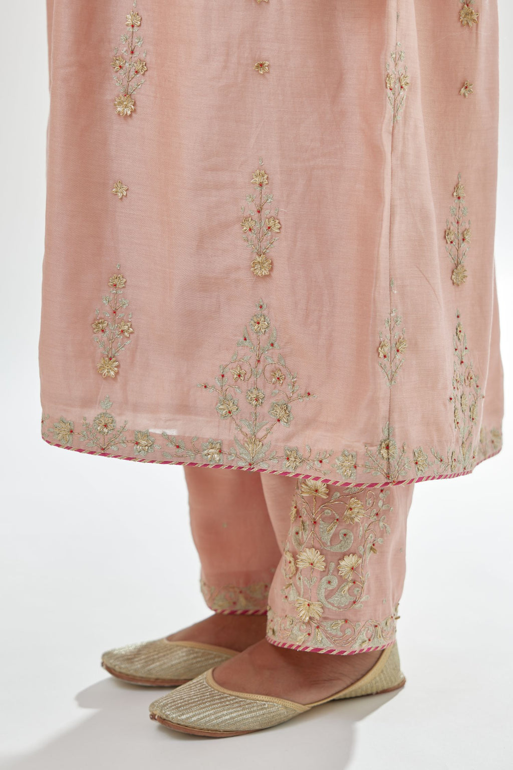 Pink silk chanderi kurta-dress set with zari, dori and gota embroidery, highlighted with contrast bead work.