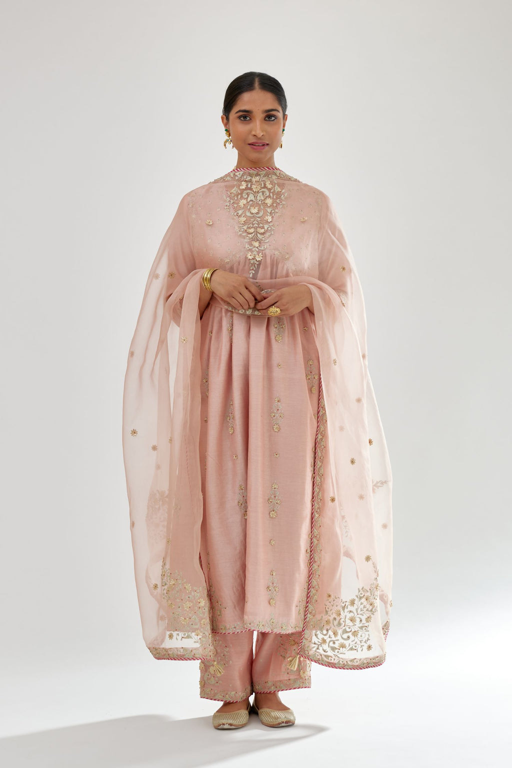 Pink silk chanderi kurta-dress set with zari, dori and gota embroidery, highlighted with contrast bead work.