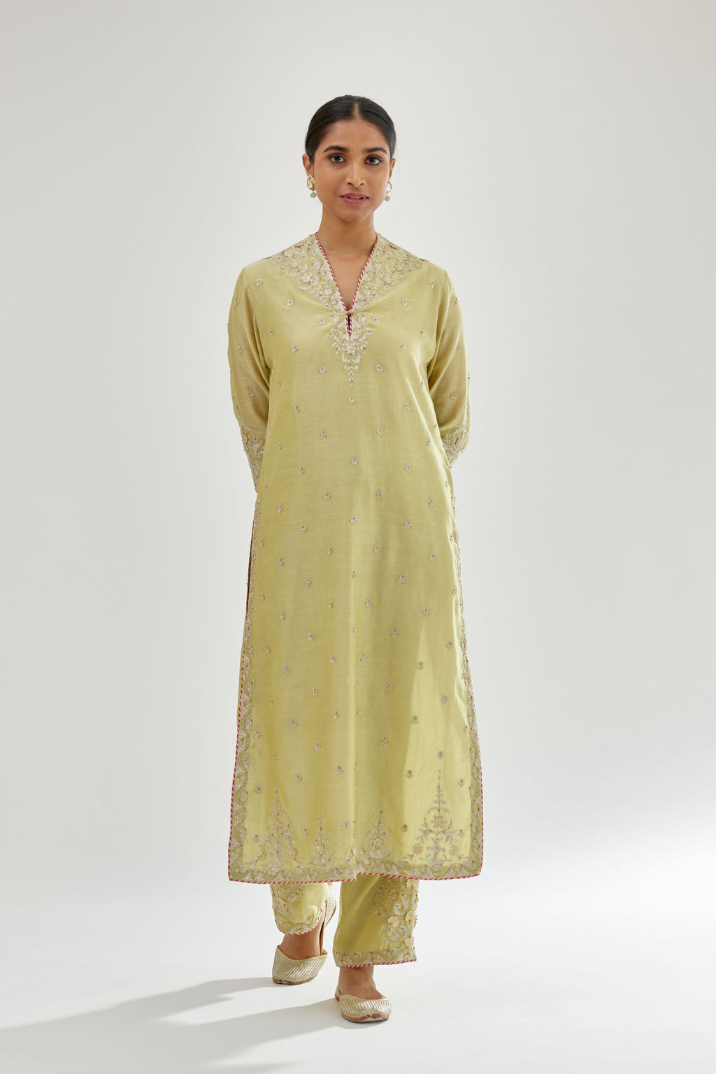 Green silk chanderi straight kurta set with zari, dori and gota embroidery, detailed with all-over delicate aari embroidery buties.