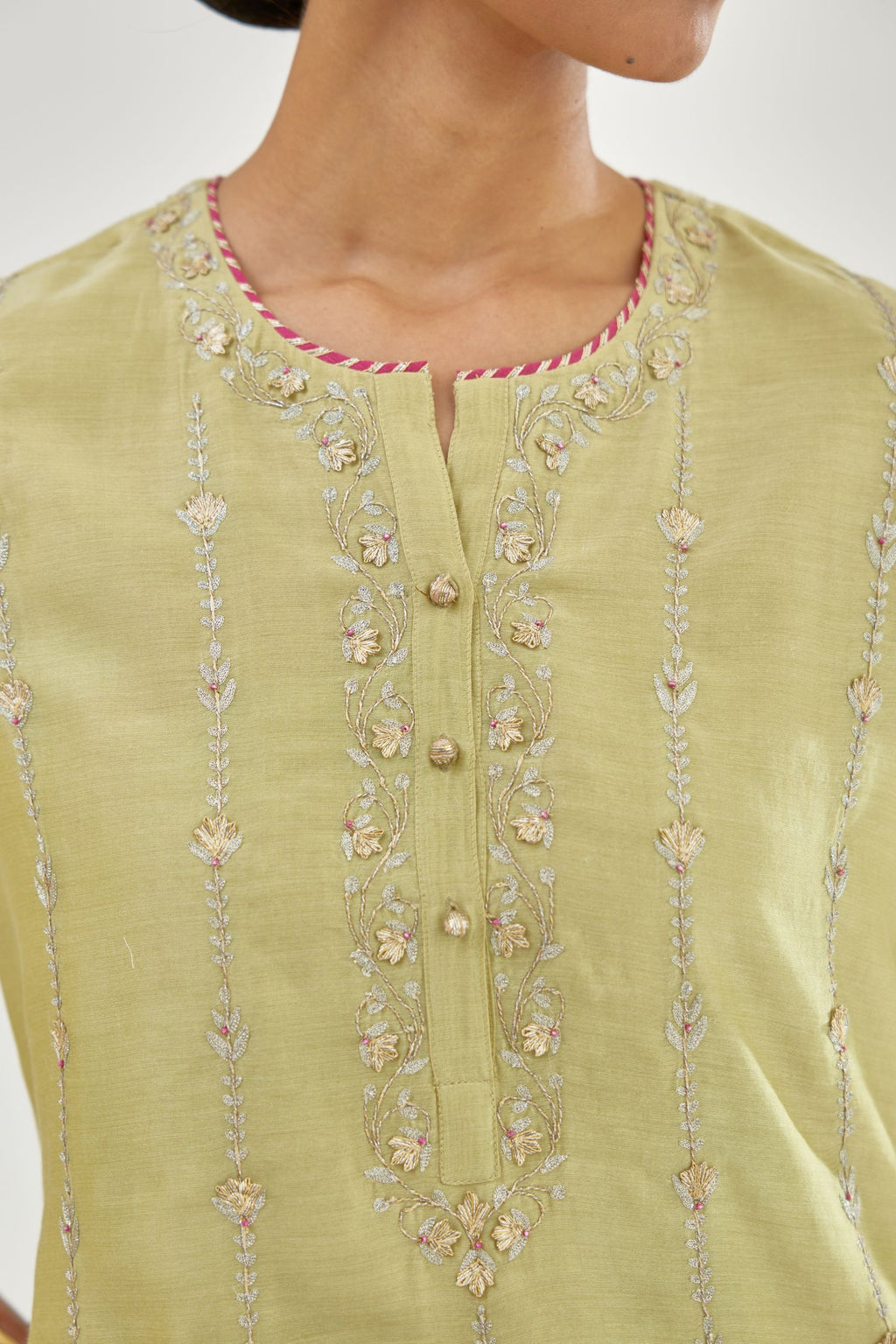 Green silk chanderi straight kurta set with all over heavy dori and gota embroidery work, highlighted with contrast bead work.