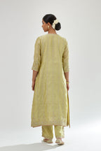 Green silk chanderi straight kurta set with all over heavy dori and gota embroidery work, highlighted with contrast bead work.