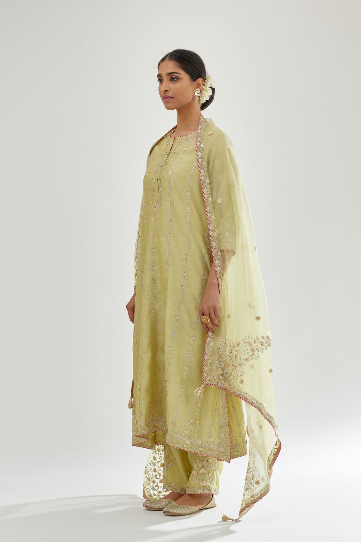 Green silk organza dupatta with dori and gota embroidery at edges, highlighted with contrast bead work.