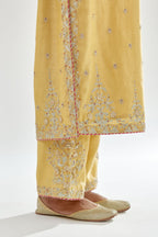 Yellow silk chanderi straight kurta set with zari, dori and gota embroidery, detailed with all-over delicate aari embroidery buties.