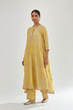 Yellow A-line long kurta set with all-over zari, dori, sequins and gota embroidery.