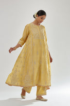 Yellow A-line long kurta set with all-over zari, dori, sequins and gota embroidery.