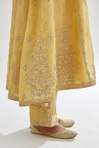 Yellow A-line long kurta set with all-over zari, dori, sequins and gota embroidery.