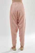 Pink silk chanderi salwar, detailed with zari, dori, bead and gota embroidered boota at sides.