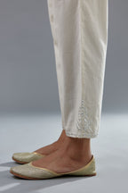 Off white cotton comfortable fit pant with all-over elasticated waistband.
