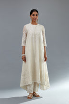 Off white A-line long kurta set with all-over tonal silk thread embroidery and cotton applique, highlighted with sequins work.