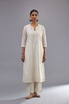 Off white silk chanderi straight kurta set with all over dori and silk thread embroidery.