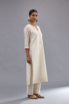 Off white silk chanderi straight kurta set with all over dori and silk thread embroidery.