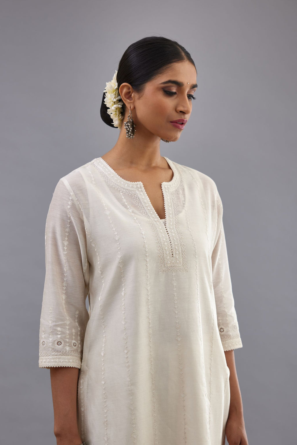Off white silk chanderi straight kurta set with all over dori and silk thread embroidery.