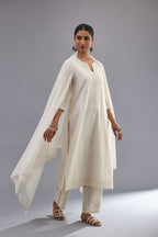 Off white silk chanderi straight kurta set with all over dori and silk thread embroidery.