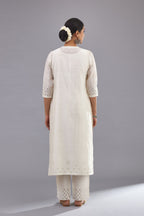 Off white silk chanderi straight kurta set with dori and silk thread chhari - stripes, all over and heavier butas at hem.