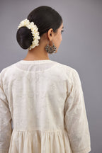 Handspun handwoven cotton  kurta set with wavy empire waistline and gathers, highlighted with all-over tonal colored thread embroidery and ric-rac detail.