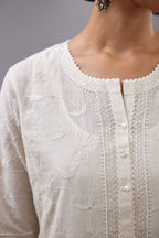Off-white Handspun handwoven cotton kurta set with all-over jaal embroidery and small assorted flowers embroidery at side panells, highlighted with sequins handwork.