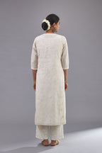 Off-white Handspun handwoven cotton kurta set with all-over jaal embroidery and small assorted flowers embroidery at side panells, highlighted with sequins handwork.