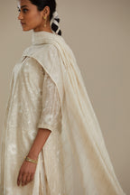 Silk chanderi straight kurta set with all-over faggoting overlayed with floral jaal threadwork, highlighted with sequins.