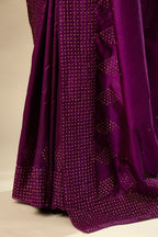 Plum purple silk saree set with a broad sequin border with diamond motifs.