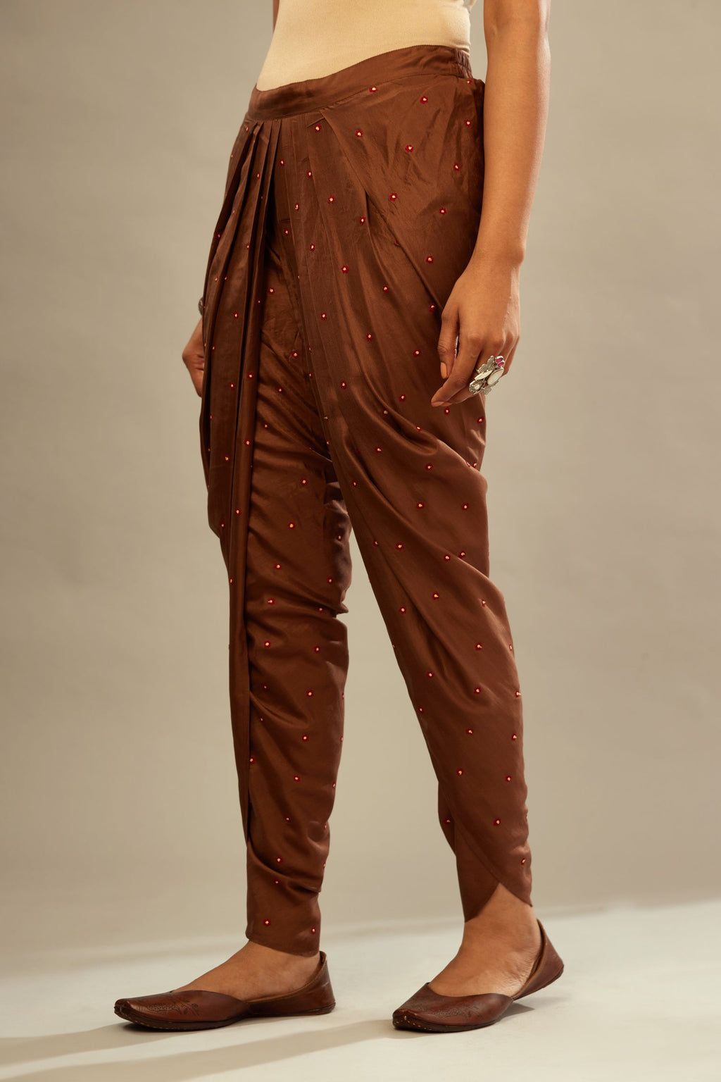 Brown silk dhoti with all over small flower embroidery.