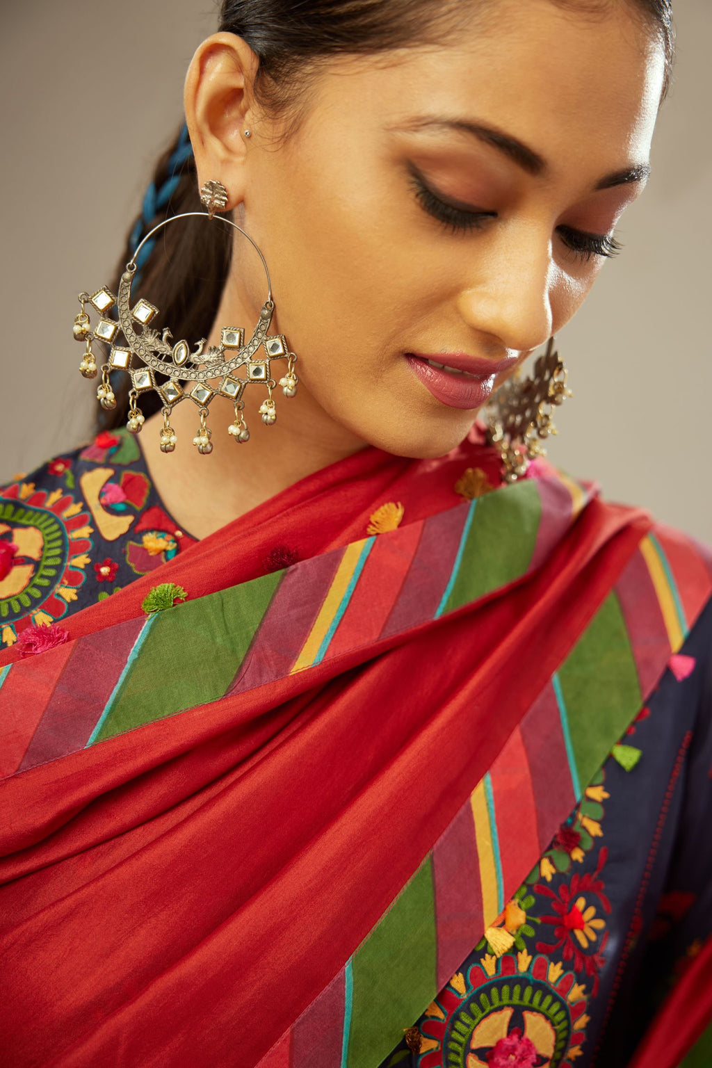Indigo kalidar straight kurta set, fully embroidered with appliqué flowers, multi-colored aari threadwork and silk tassels.