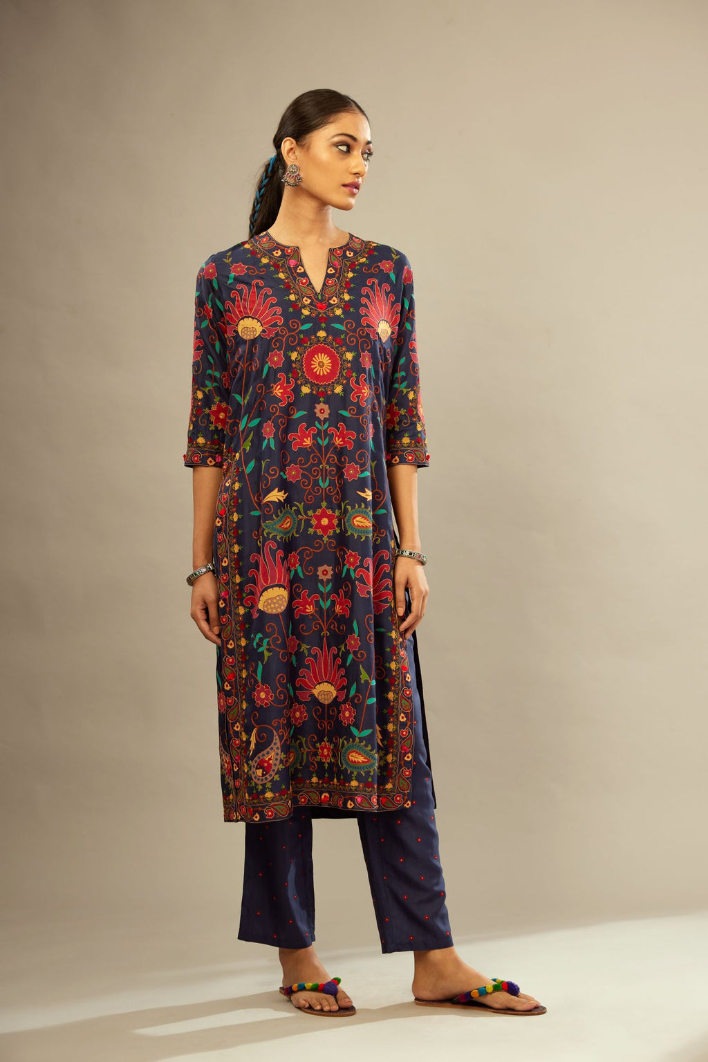 Indigo straight kurta set, fully embroidered with bold appliqué flowers, multi-colored aari threadwork and silk tassels.