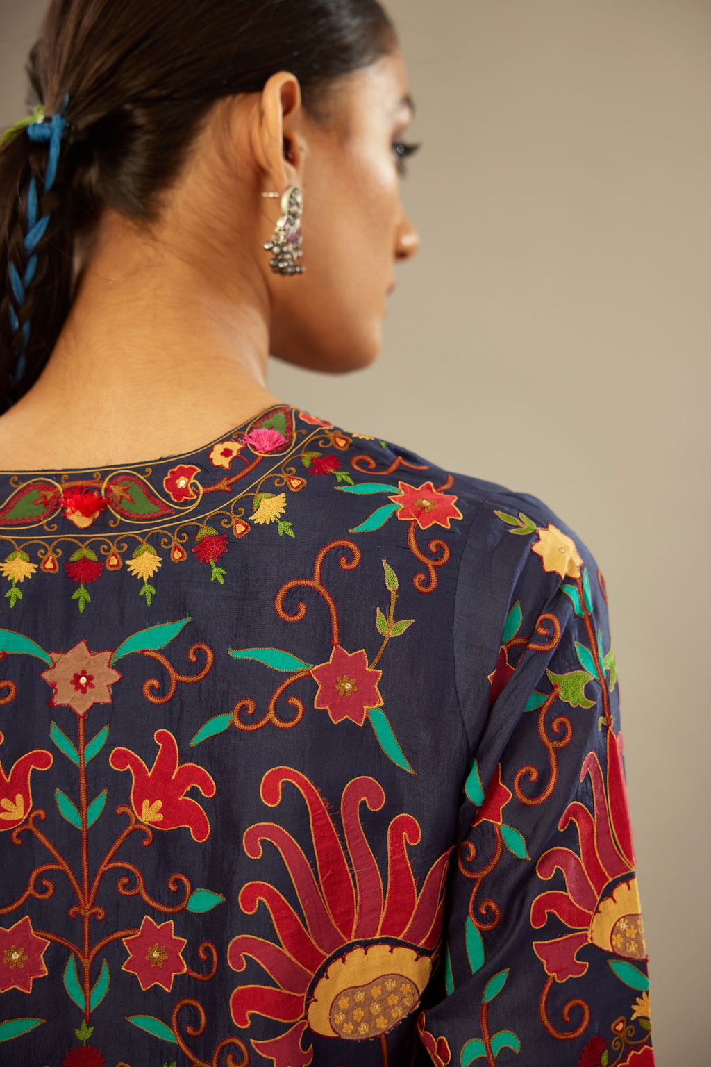 Indigo straight kurta set, fully embroidered with bold appliqué flowers, multi-colored aari threadwork and silk tassels.