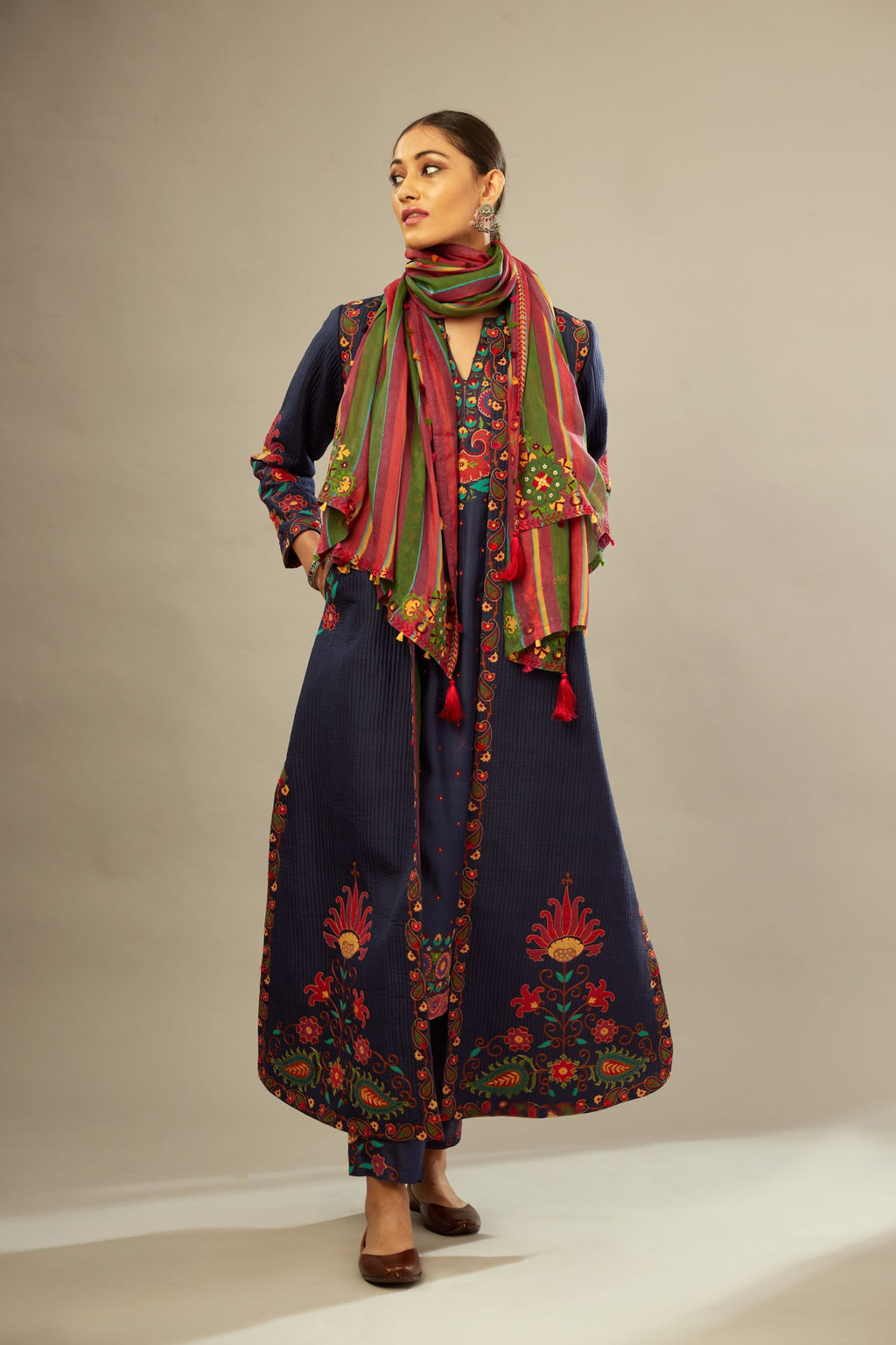Indigo quilted ankle length front open silk jacket with bold multi-colored appliqué flower trellises.