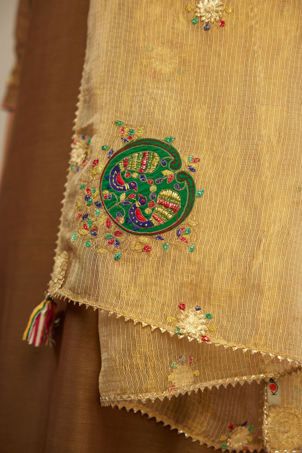 Golden kota doriya dupatta with gota flowers and embroidery all over the dupatta, highlighted with gota lace all around