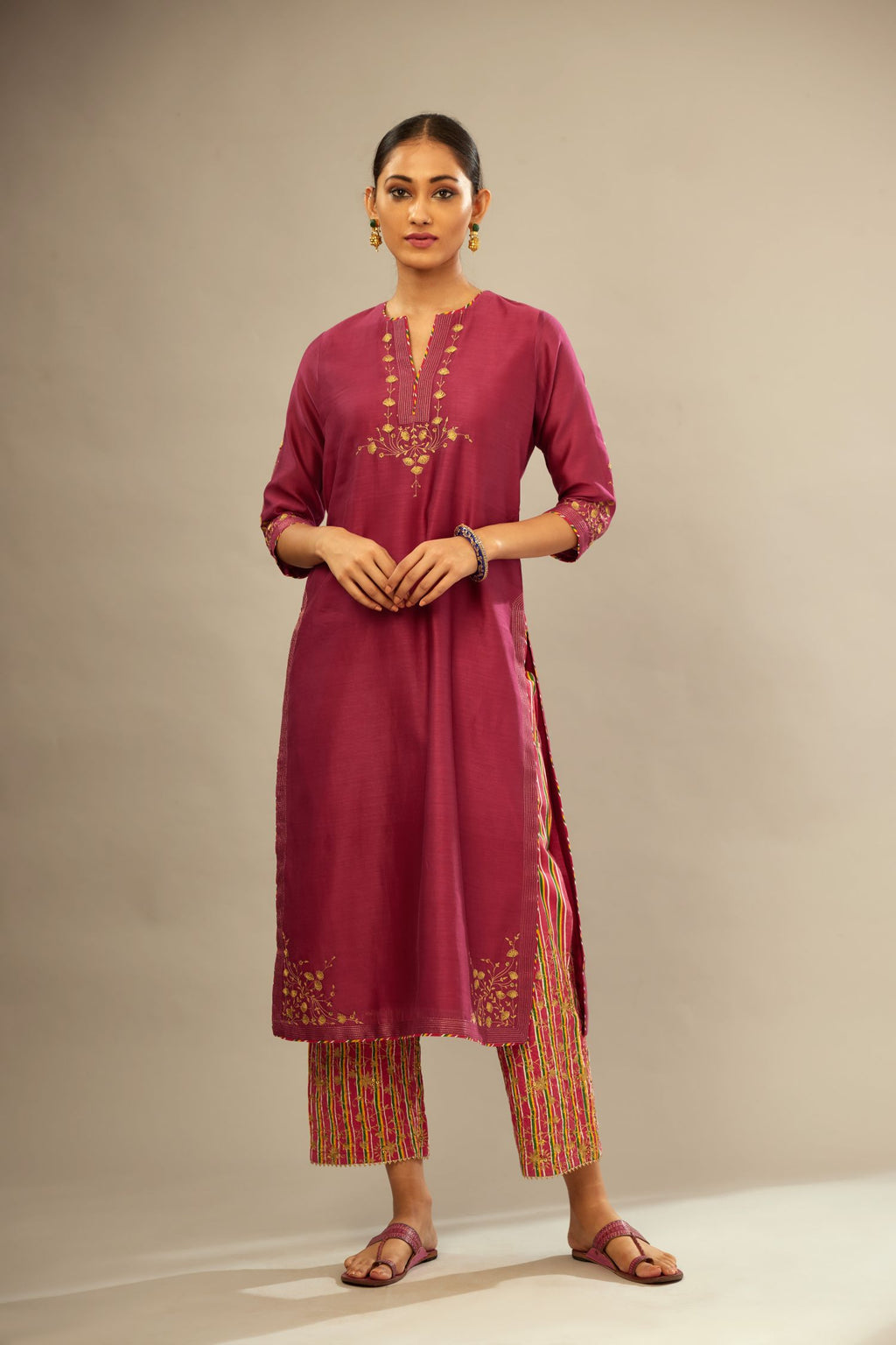 Deep wine silk Chanderi kurta set with zari embroidery, highlighted with goldenr zari quilting