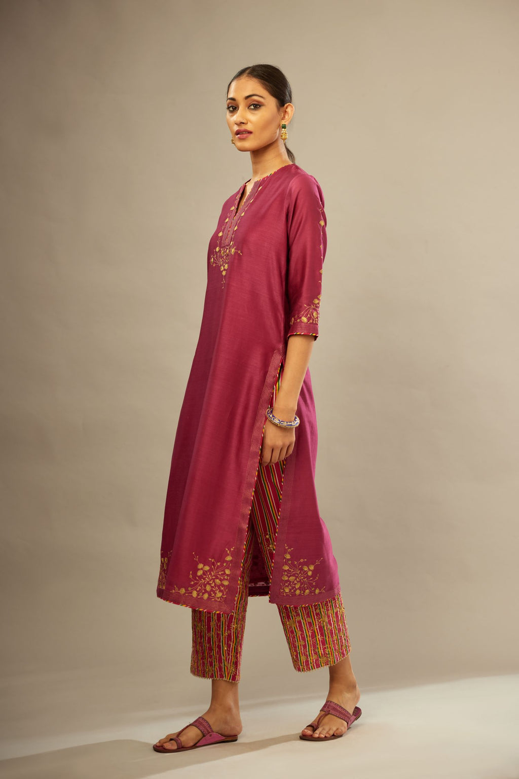 Deep wine silk Chanderi kurta set with zari embroidery, highlighted with goldenr zari quilting